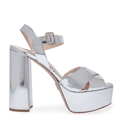 Shop Prada Shoes & Accessories for Women in KSA .